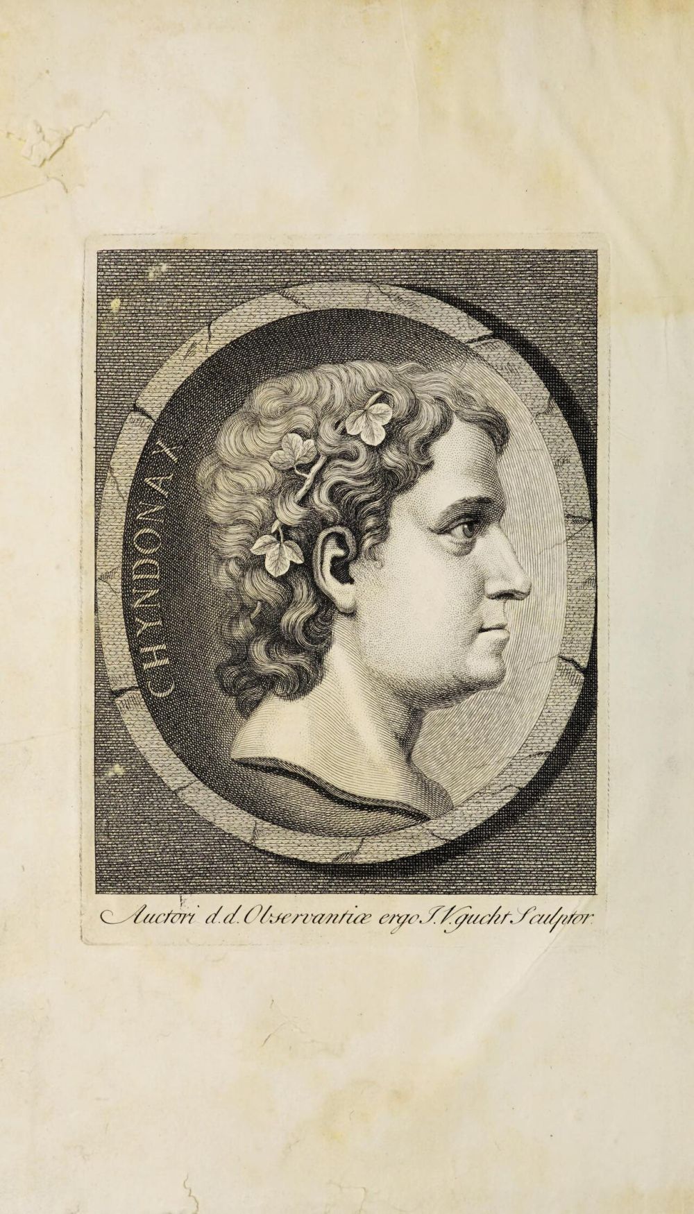 Gravure en médaillon d'un profil d'homme couronné de feuilles, entouré de l'inscription Chyndonax